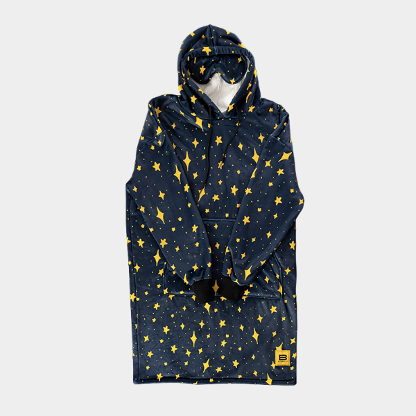 Star-patterned poncho with a hood on a light gray background