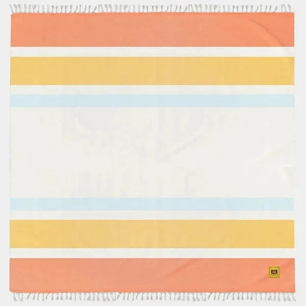 Oversized blanket with horizontal stripes in coral, yellow, light blue, and cream with fringe edges
