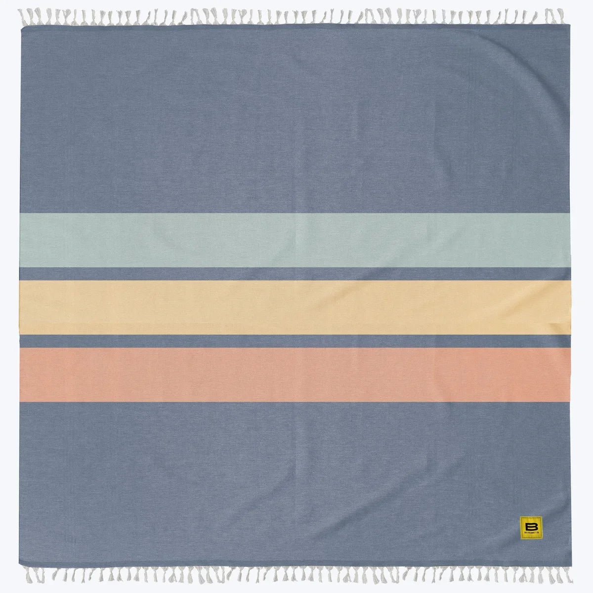 Oversized blanket with horizontal stripes in blue, mint, cream, peach and dusty blue with fringe trim