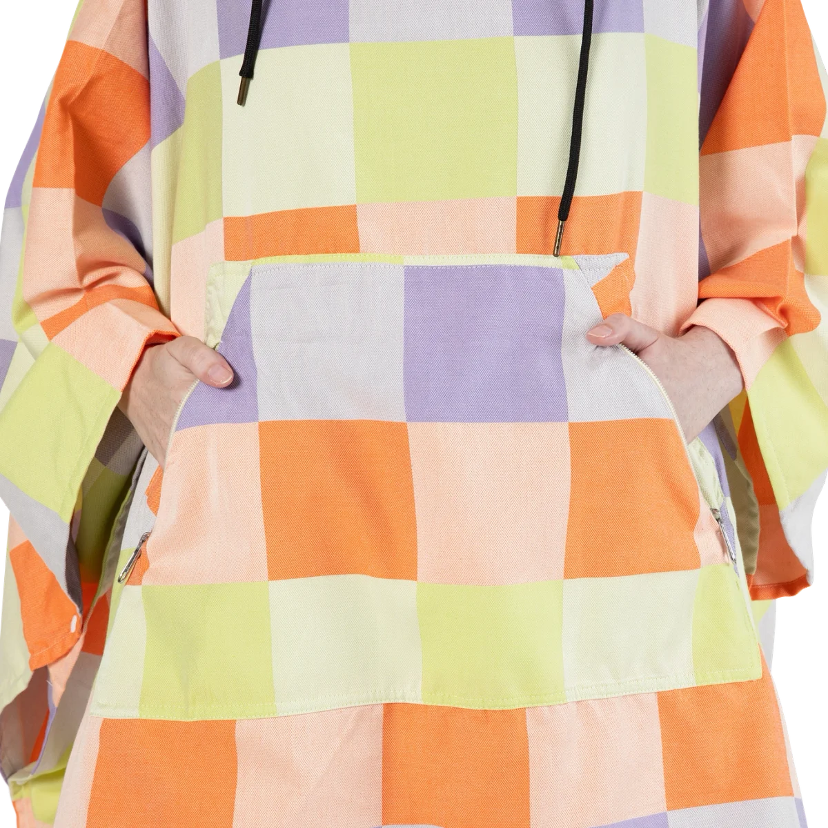 Person wearing Big Beachy Poncho in bright pastel checkerboard pattern with orange, yellow, purple, and cream squares, pullover hoodie style