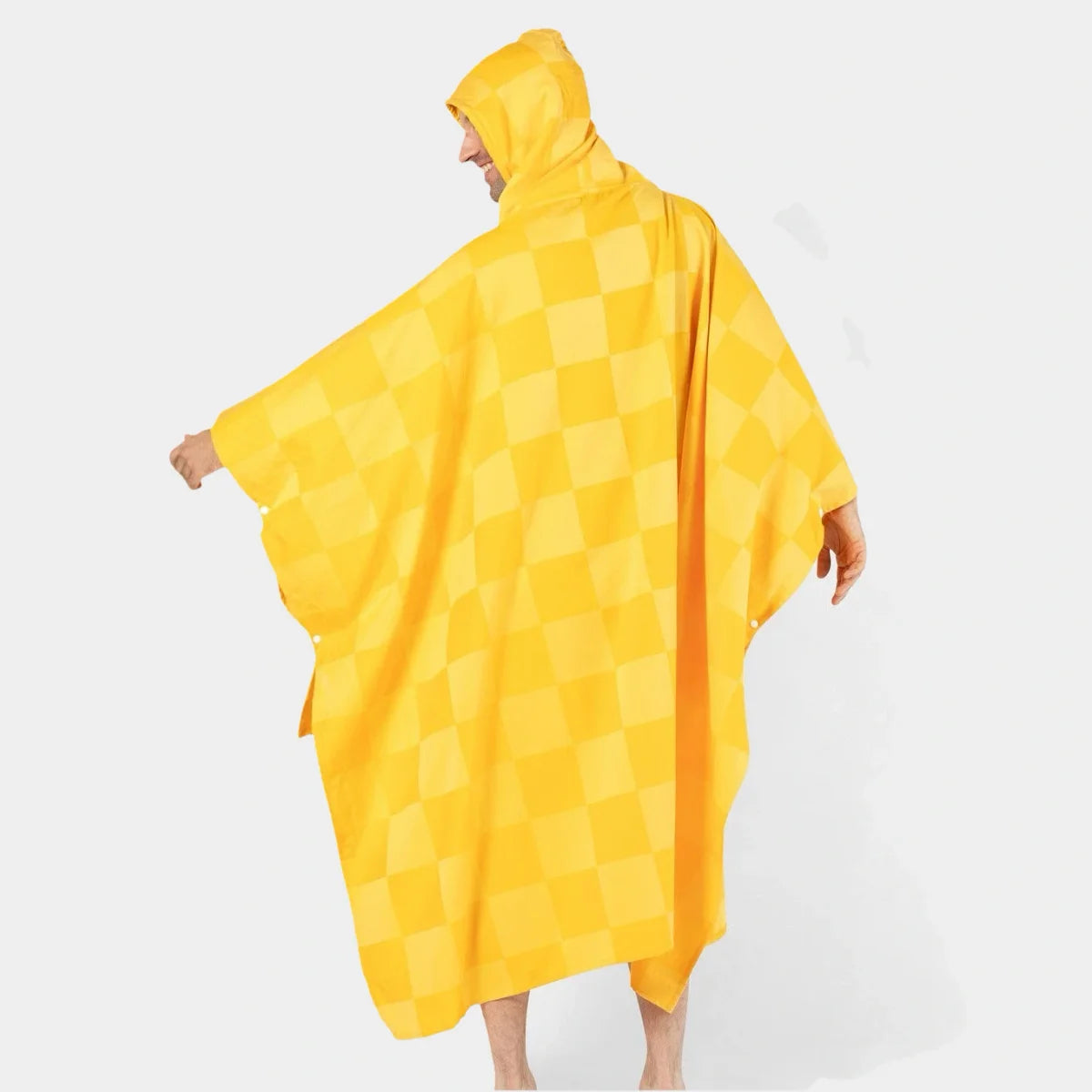 Golden yellow checkered oversized poncho blanket with hood on model