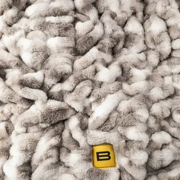 Fluffy oversized blanket with chunky gray and cream quilted texture, Cloud Luxe Blanket Onyx Sky style