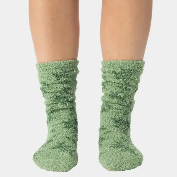 Sage green fuzzy crew socks with textured knit pattern on legs, shown as pair