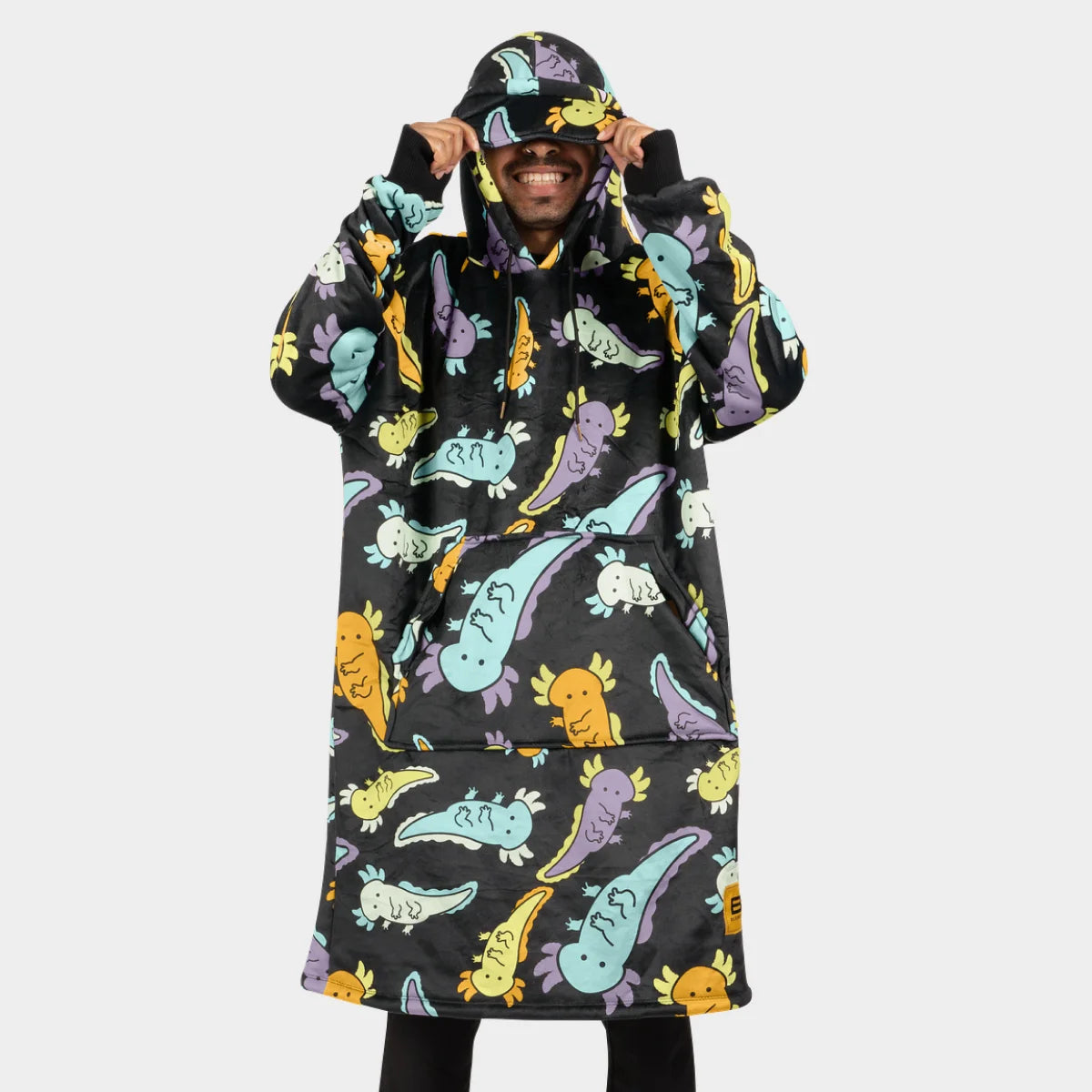 Person wearing the Axolotl Drift Hideout Hoodie™, pulling the oversized hood down over their eyes