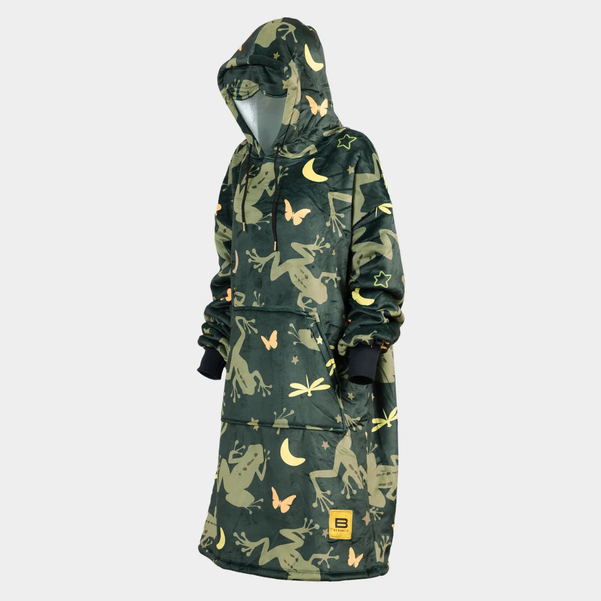 Hideout Hoodie™ wearable blanket in Dreamy Frogs, side view — deep forest-green ground with olive tree frogs, stars, moons and peach butterflies
