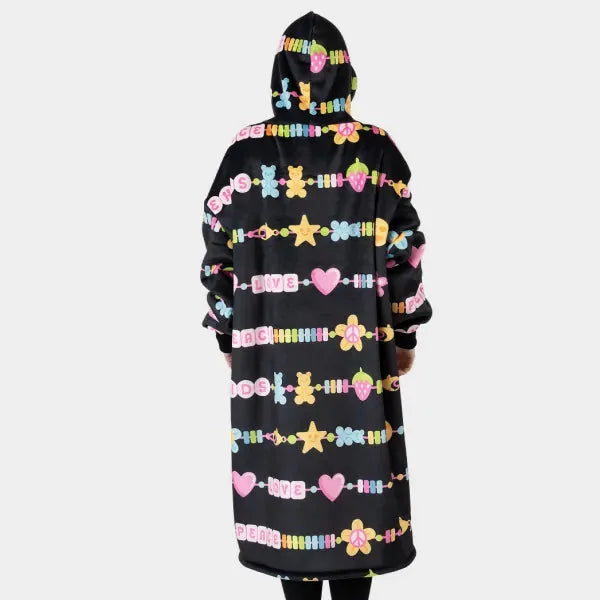 Black oversized hoodie blanket with colorful beaded necklace stripe pattern, front view with hood up