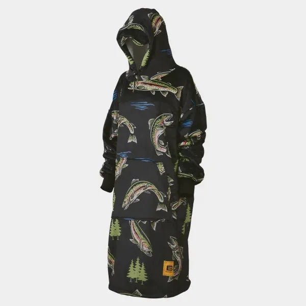 Black oversized hoodie blanket with fishing and forest pattern, worn by model with hood up