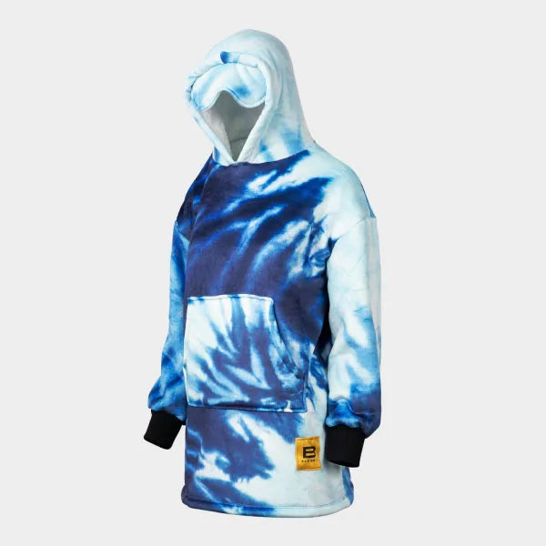 Blue tie-dye oversized hoodie blanket with kangaroo pocket and black cuffs on dress form