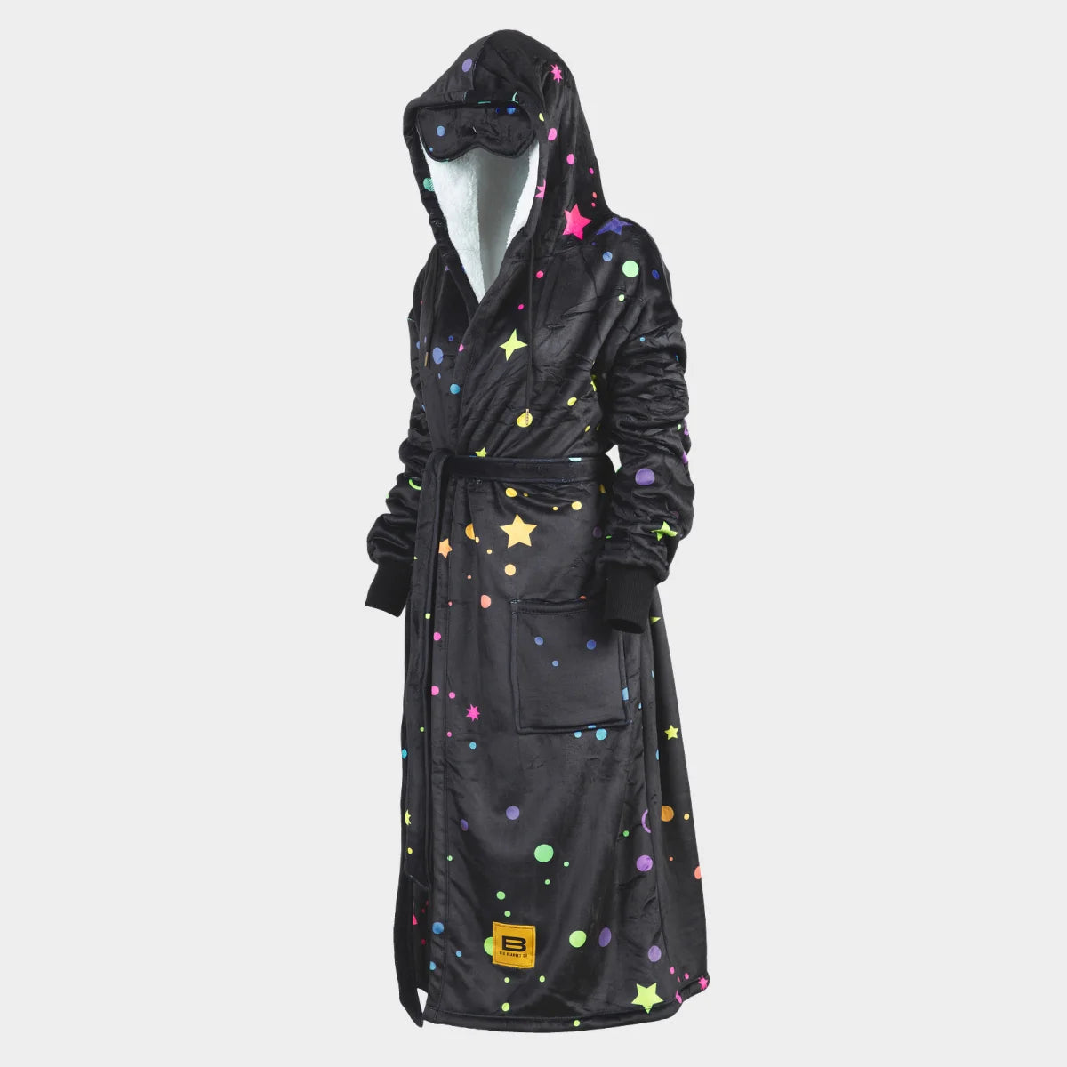 Hideout Robe™ in Electric Sky, side view showing the hood, tie belt and patch pockets — charcoal ground scattered with multicolour stars, sparkles and dots in pink, teal, yellow, blue and green