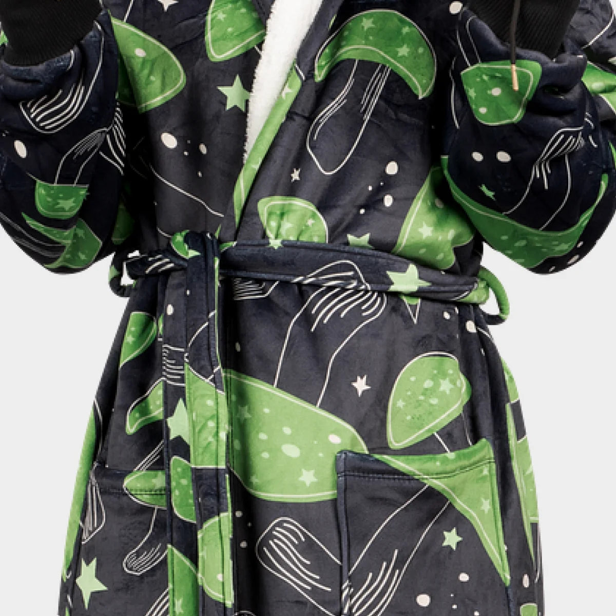 Close-up of the Mystic Mushrooms Hideout Robe™ tie belt, patch pocket and sherpa-lined lapel