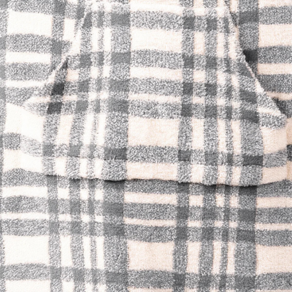 Close-up of the Grey Plaid Premier Plush™ Hoodie fabric, front pouch and drawstrings