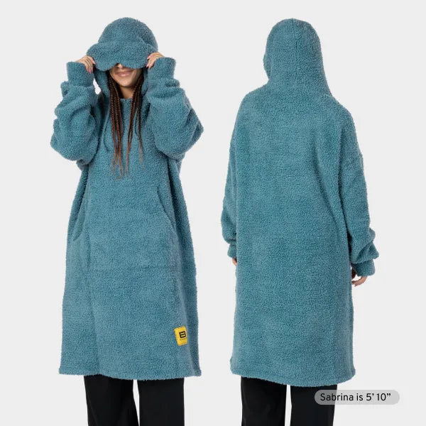 Teal Premier Plush Hoodie worn as oversized blanket with attached hood and kangaroo pocket, front and back view