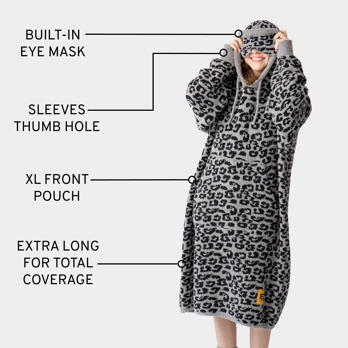 Black leopard print oversized hoodie blanket with built-in eye mask, sleeves, thumb holes, and XL front pouch