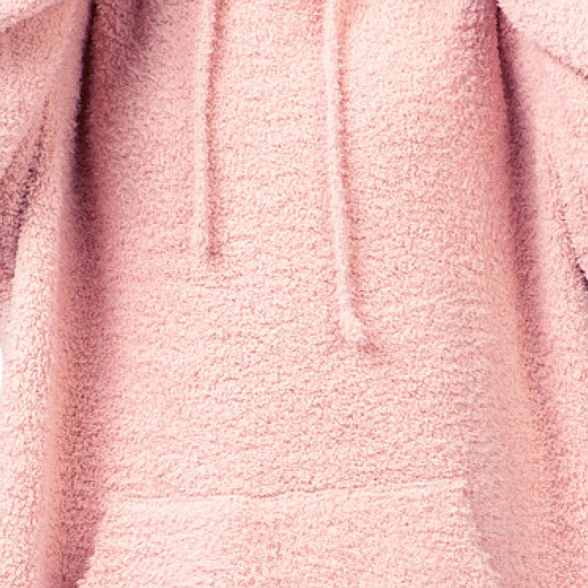 Soft blush pink oversized blanket hoodie with plush textured fabric and deep front pouch