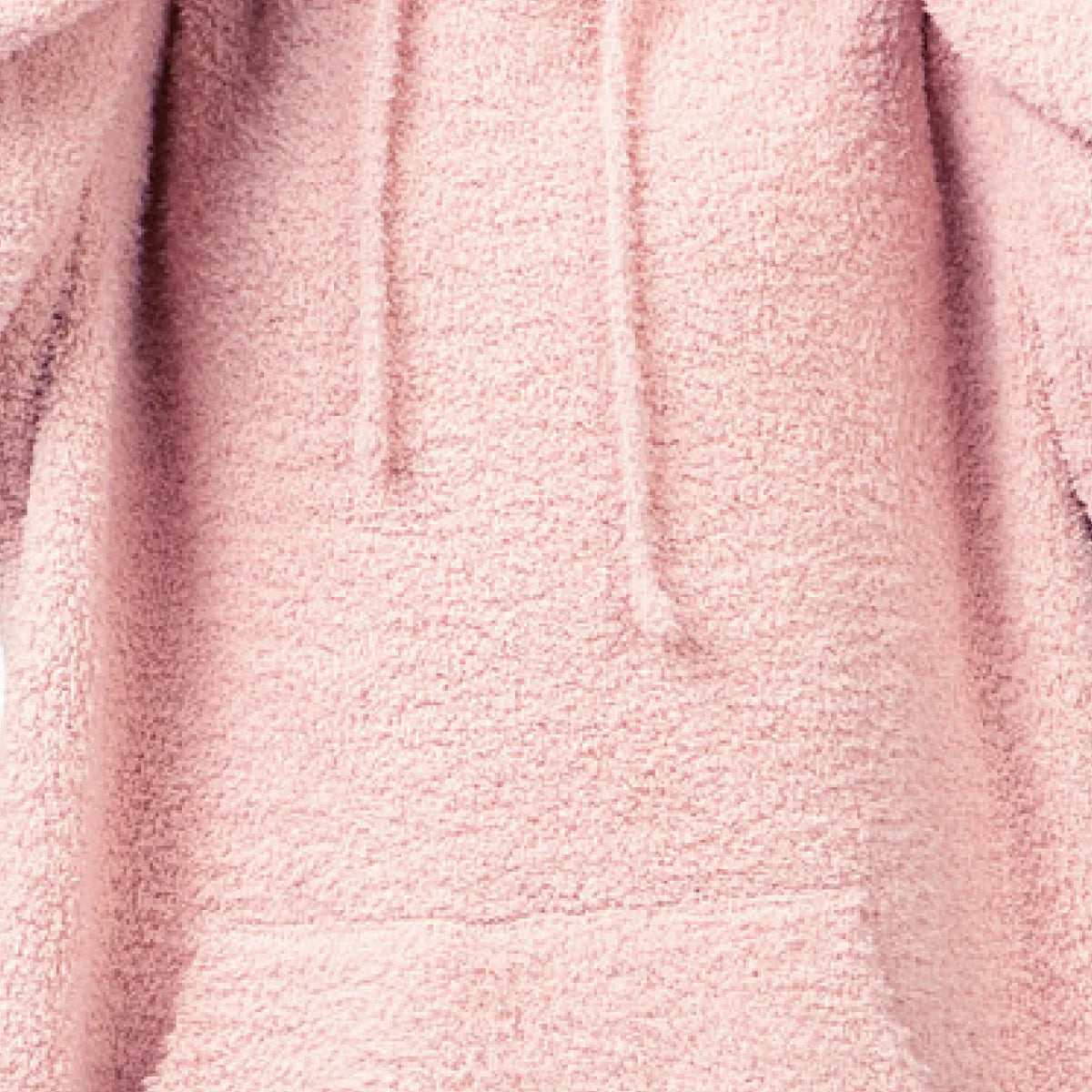 Blush pink oversized kids hoodie blanket with soft plush texture and draped folds