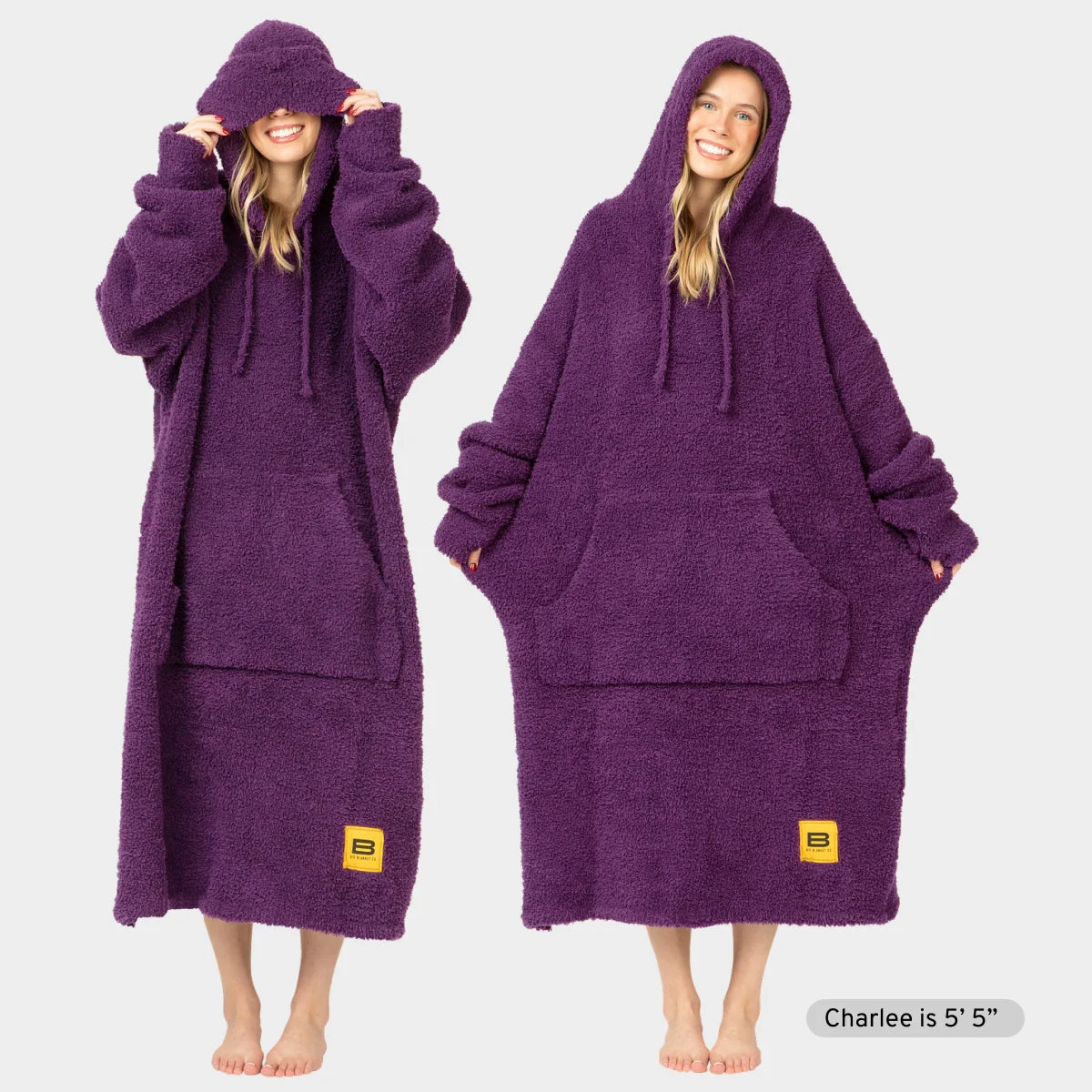 Deep purple oversized hoodie blanket with kangaroo pouch and drawstring hood, shown on model in two poses