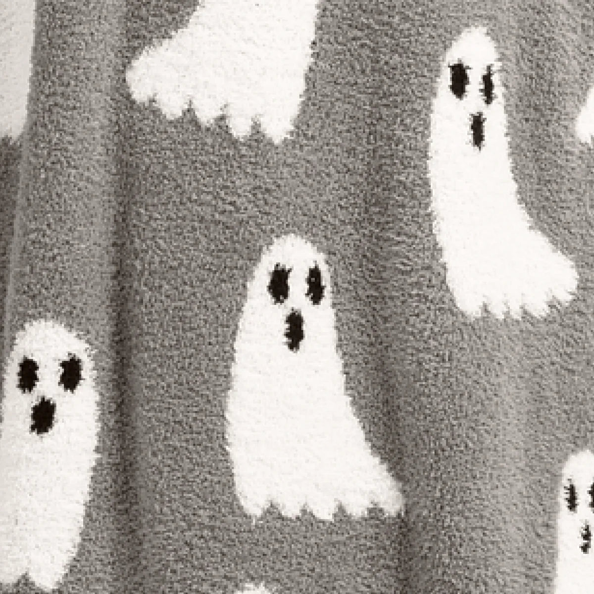 Gray and white oversized blanket with ghost pattern and eye details, Premier Plush Hoodie style