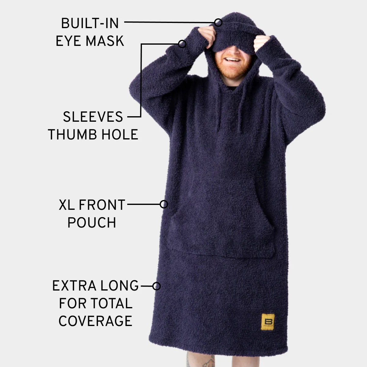 Navy Premier Plush hoodie blanket with built-in eye mask, thumb hole sleeves, XL front pouch, and extra-long coverage