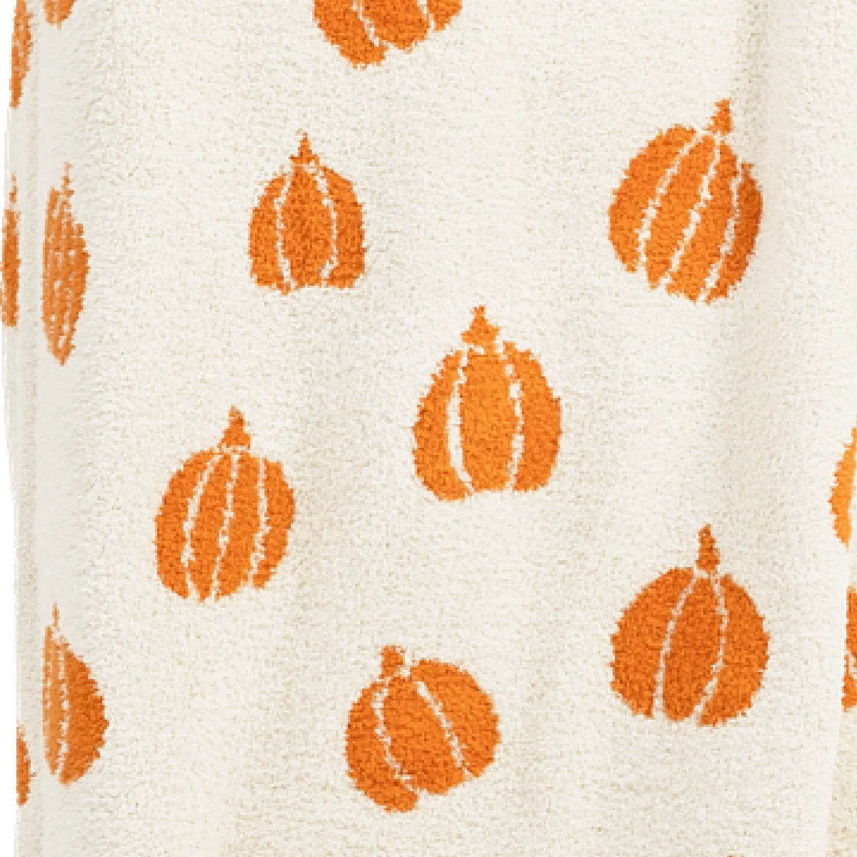 Cream oversized blanket with orange pumpkin pattern and white details