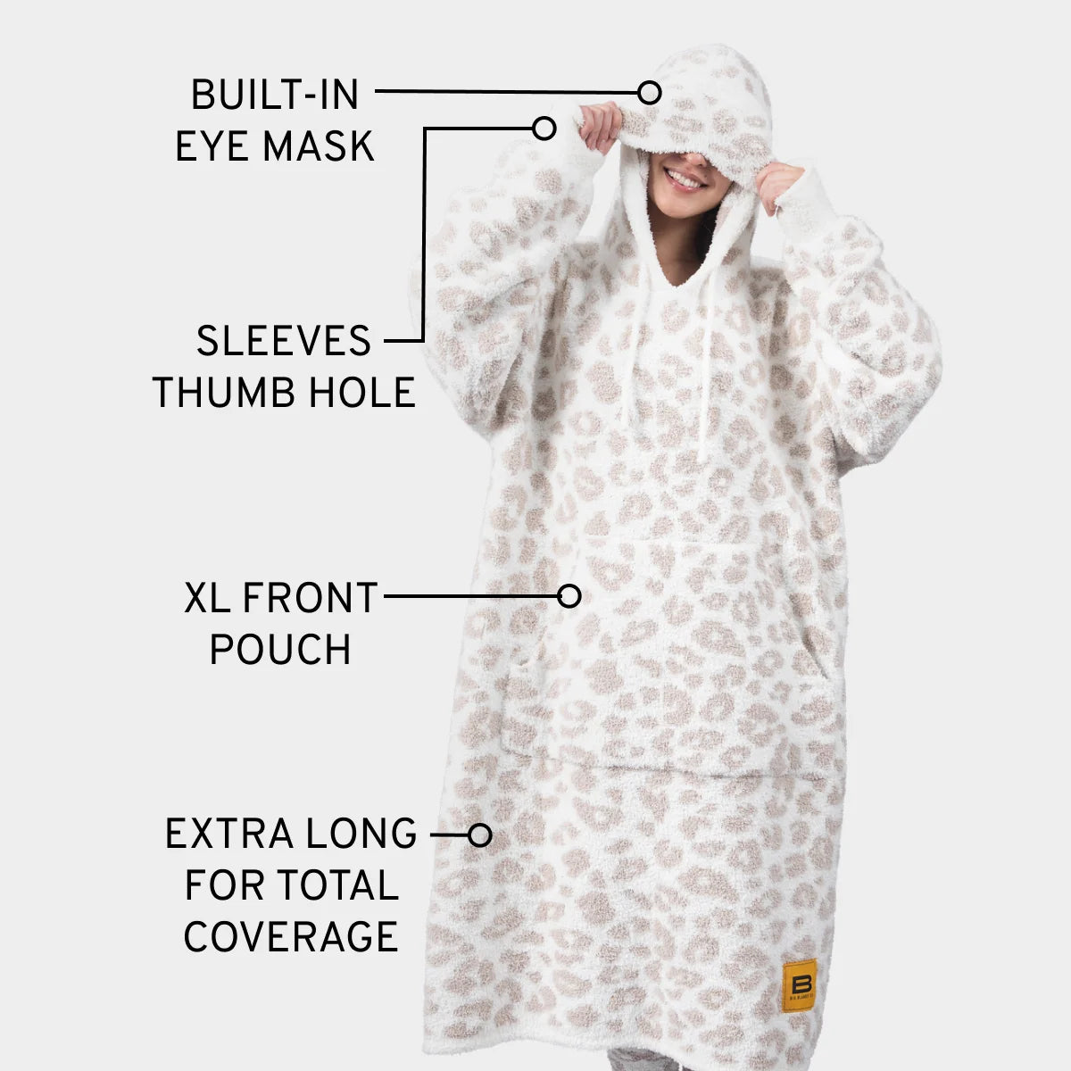 Cream and taupe leopard print oversized blanket hoodie with built-in eye mask, sleeves with thumb holes, XL front pouch, and extra-long coverage