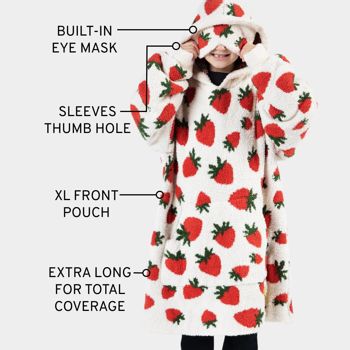 Strawberry-patterned cream oversized hoodie blanket with built-in eye mask, sleeves with thumb holes, XL front pouch, extra-long coverage