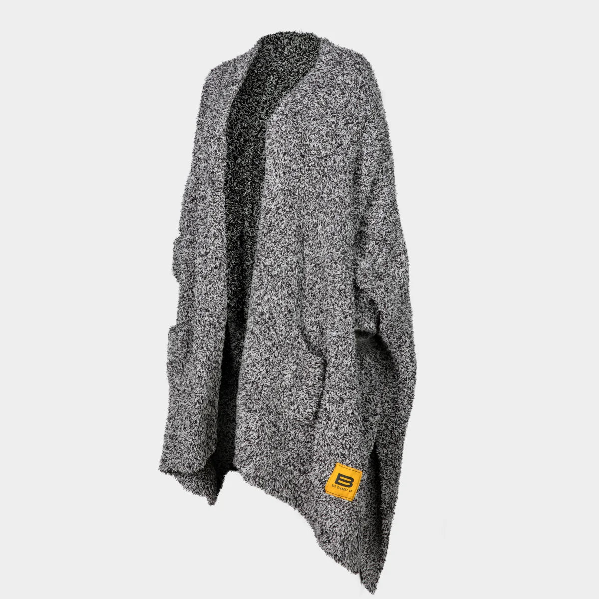 Black Heather Premier Plush oversized wrap blanket draped showing soft, luxurious texture and Big Blanket Co tag