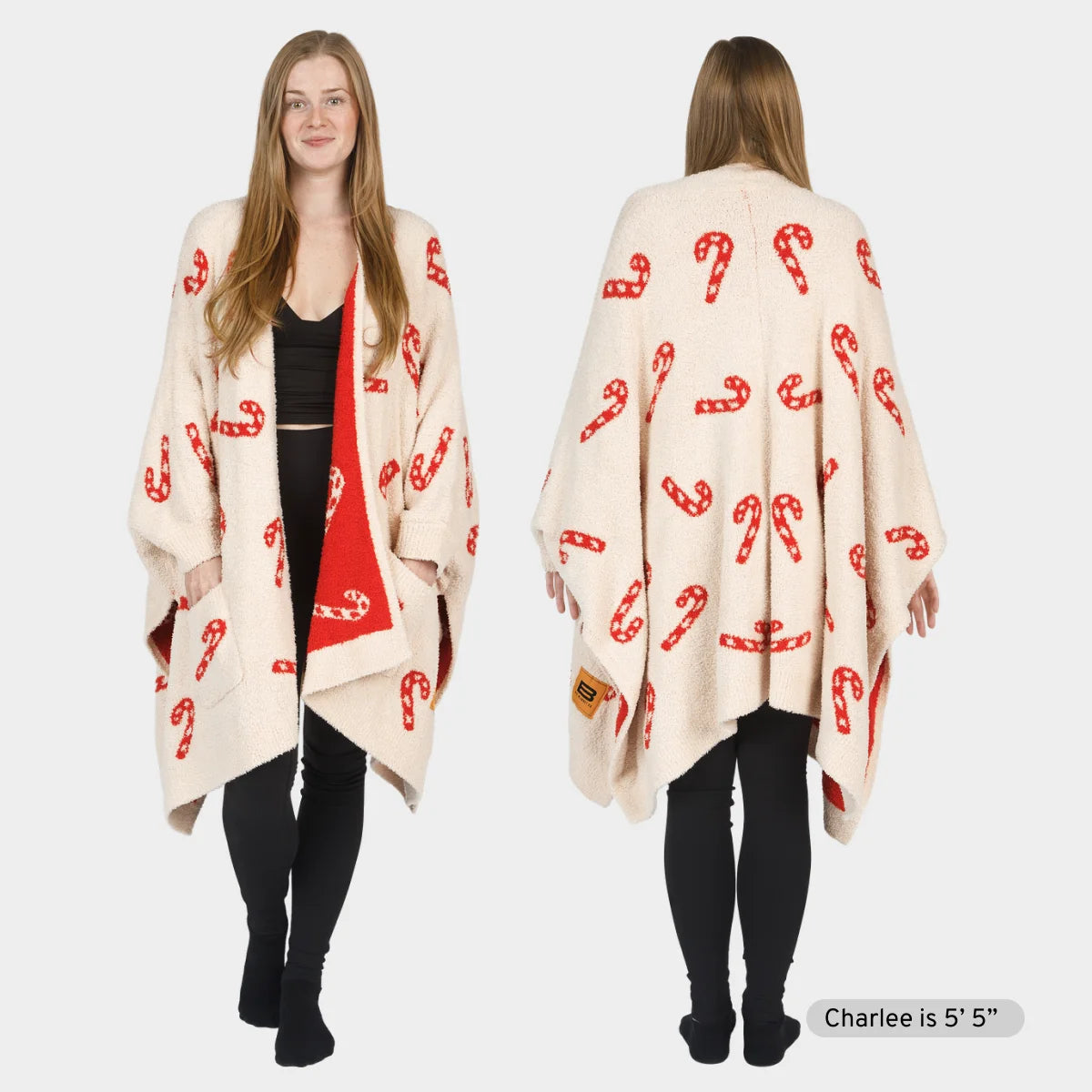 Cream Premier Plush wrap with red candy cane pattern worn as oversized blanket shawl, front and back view