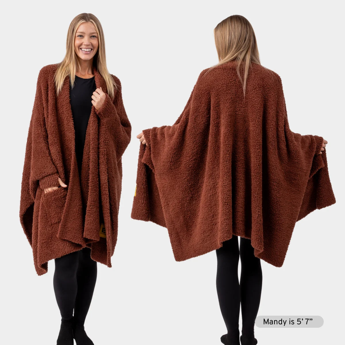 Woman wearing rust-brown oversized Premier Plush wrap draped over shoulders, front and back views showing soft textured fabric and relaxed fit