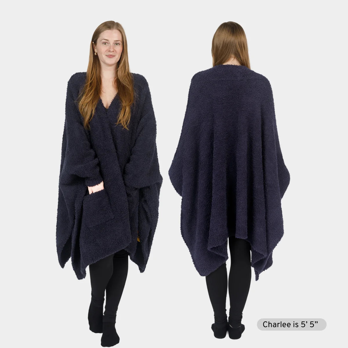 Woman wearing dark navy Premier Plush Wrap shown from front and back, oversized blanket wrap with textured fabric draping over shoulders
