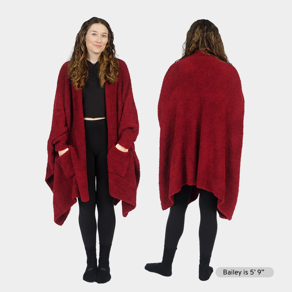 Woman wearing burgundy Premier Plush Wrap oversized blanket cardigan with pockets, front and back views