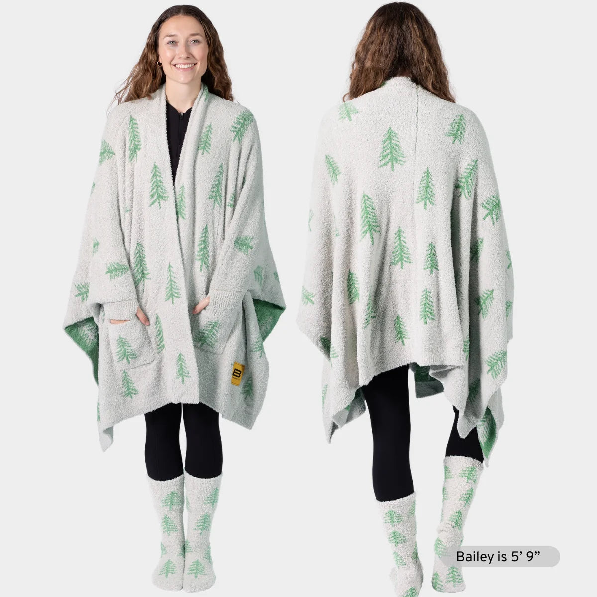 Woman wearing cream and green pine tree patterned oversized blanket wrap, front and back views